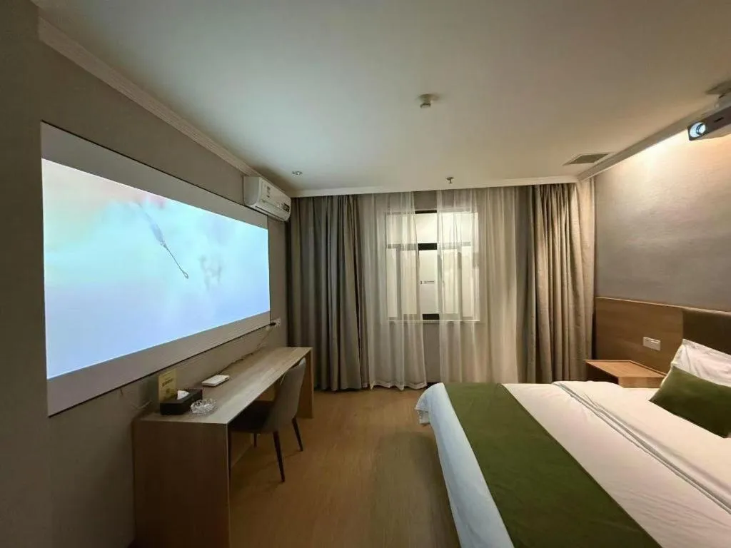 Bed in GreenTree Inn Jiangsu Suzhou Kunshan Beimen Road Express Hotel