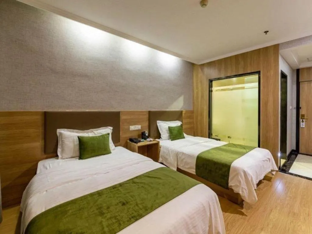 Bed in GreenTree Inn Jiangsu Suzhou Kunshan Beimen Road Express Hotel