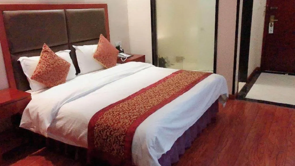 Bed in GreenTree Inn Jiangsu Suzhou Kunshan Beimen Road Express Hotel