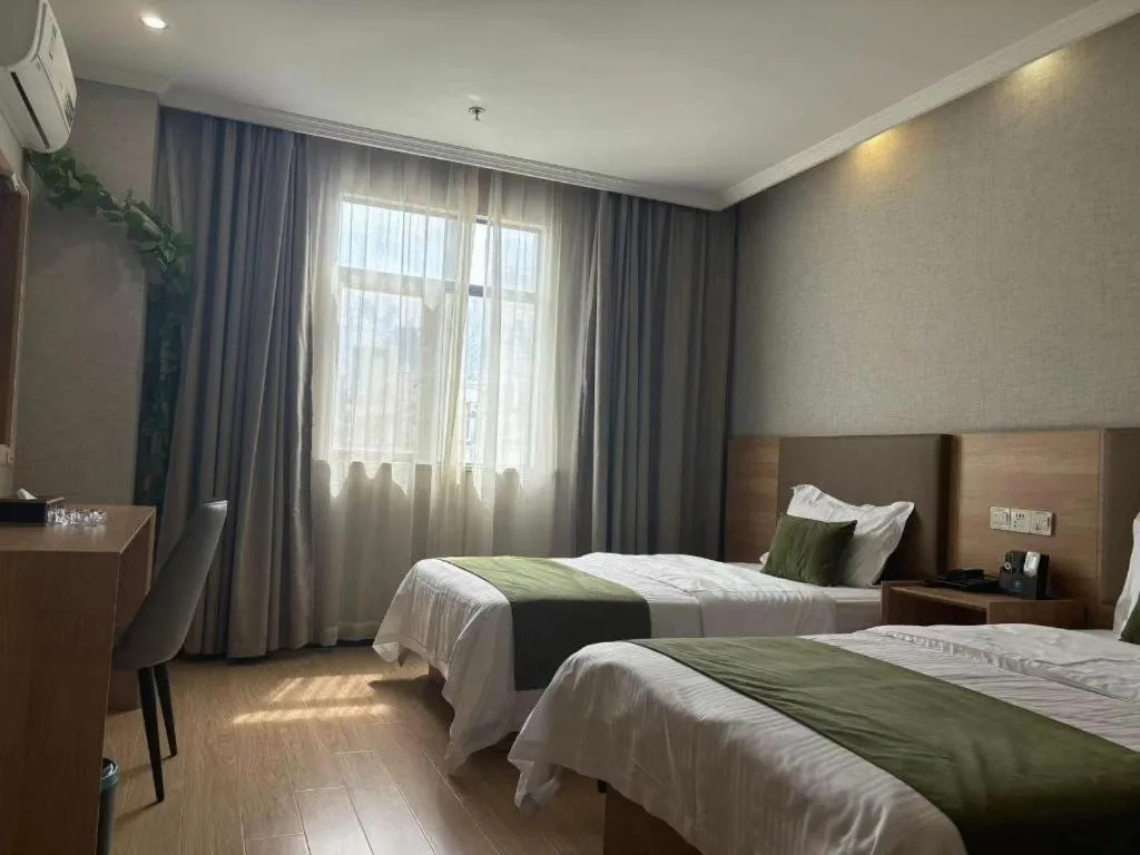 Bed in GreenTree Inn Jiangsu Suzhou Kunshan Beimen Road Express Hotel