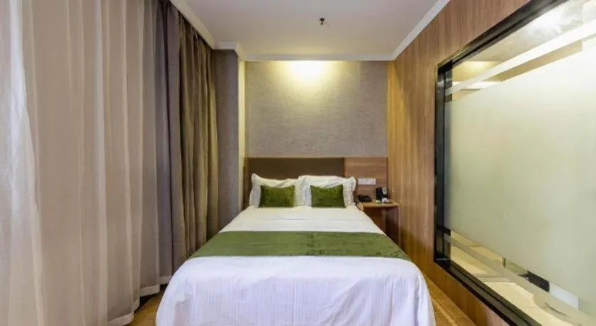 Bed in GreenTree Inn Jiangsu Suzhou Kunshan Beimen Road Express Hotel