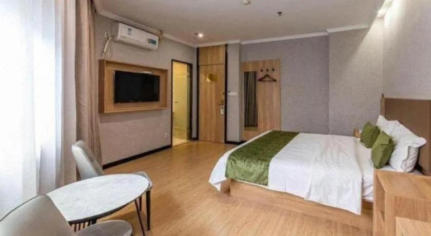 Bed in GreenTree Inn Jiangsu Suzhou Kunshan Beimen Road Express Hotel