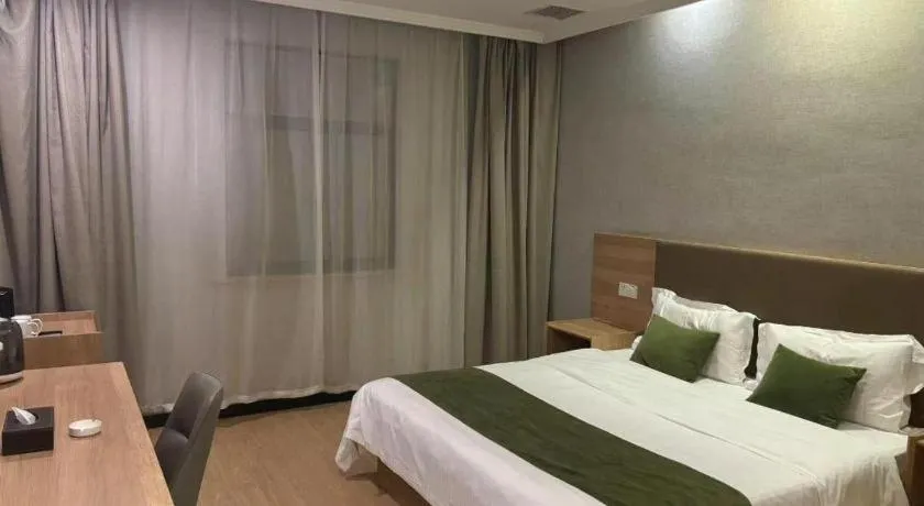 Bed in GreenTree Inn Jiangsu Suzhou Kunshan Beimen Road Express Hotel