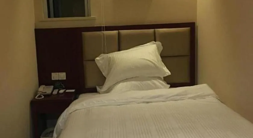 Bed in GreenTree Inn Suzhou Guanqian Street Leqiao Metro Station