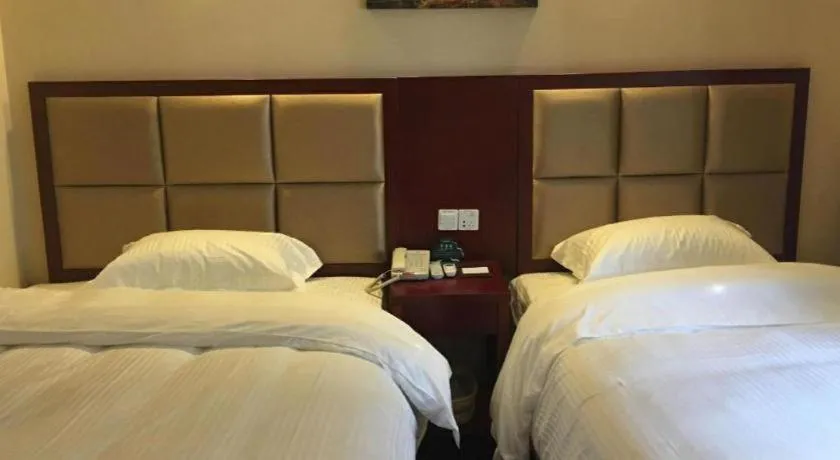 Bed in GreenTree Inn Suzhou Guanqian Street Leqiao Metro Station
