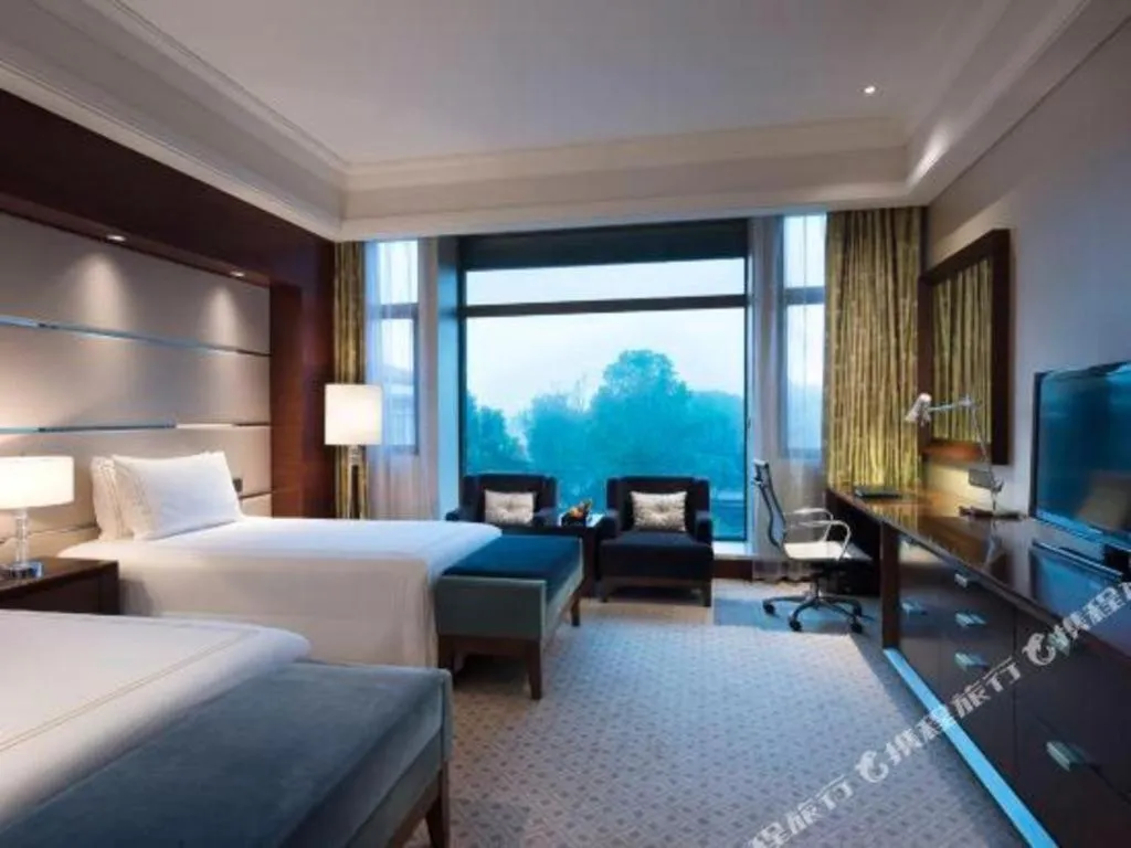 Bed in Suzhou Jinji Lake Grand Hotel