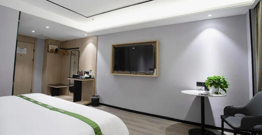 Bed in GreenTree Inn LiaoCheng LinQing HaiShan Building Express Hotel