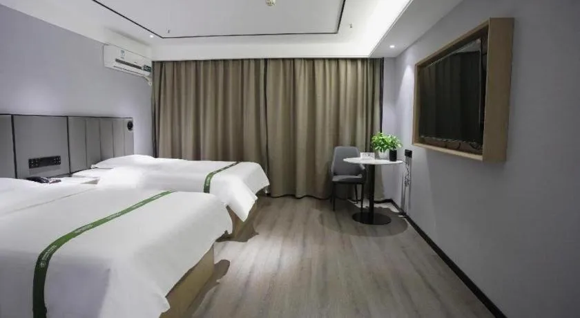 Bed in GreenTree Inn LiaoCheng LinQing HaiShan Building Express Hotel