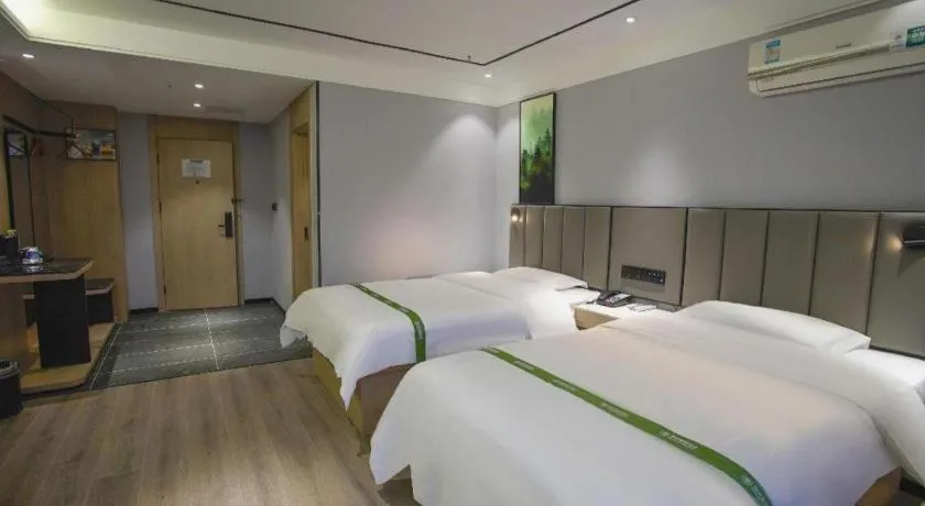 Bed in GreenTree Inn LiaoCheng LinQing HaiShan Building Express Hotel