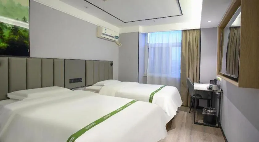 Bed in GreenTree Inn LiaoCheng LinQing HaiShan Building Express Hotel