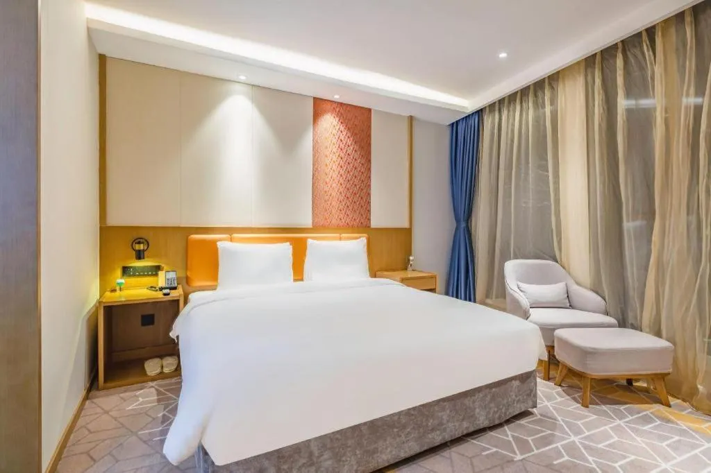 Bed in Gtel Rock City Qingdao Hotel