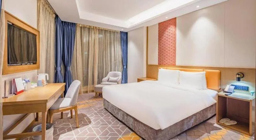 Bed in Gtel Rock City Qingdao Hotel