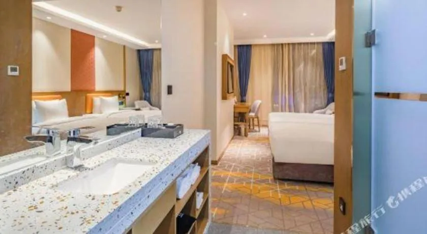 Bed in Gtel Rock City Qingdao Hotel