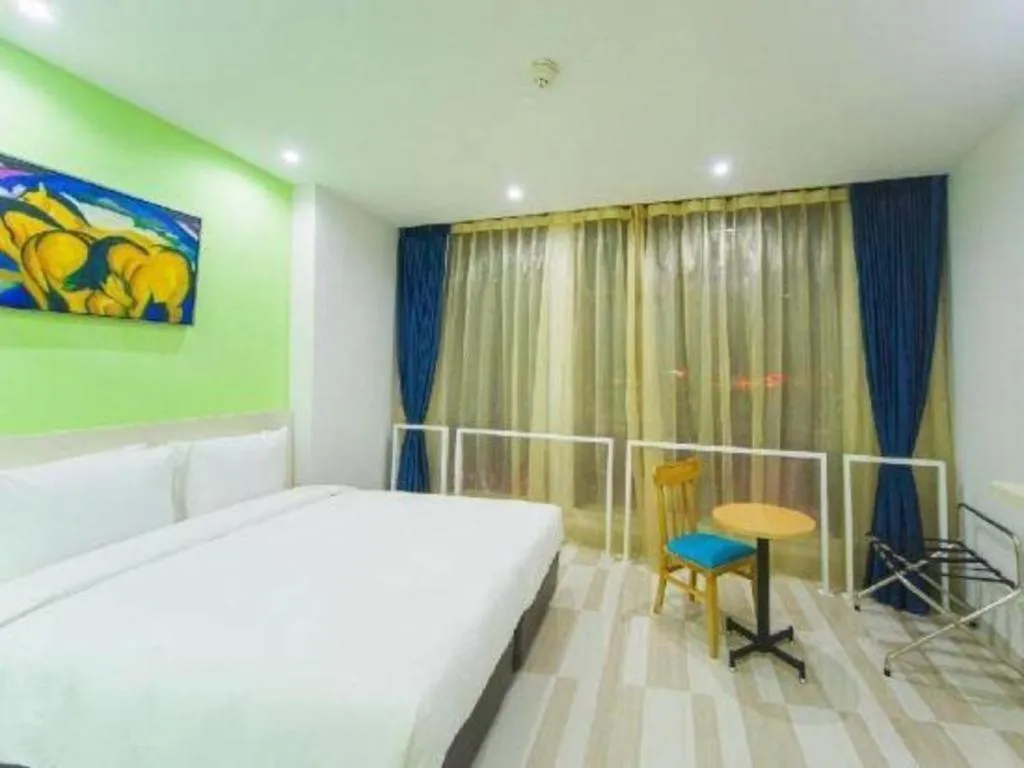 Bed in Gtel Rock City Qingdao Hotel