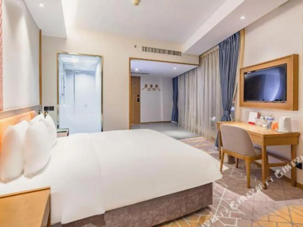 Bed in Gtel Rock City Qingdao Hotel