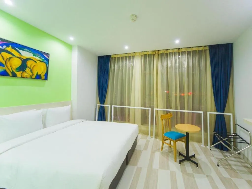 Bed in Gtel Rock City Qingdao Hotel