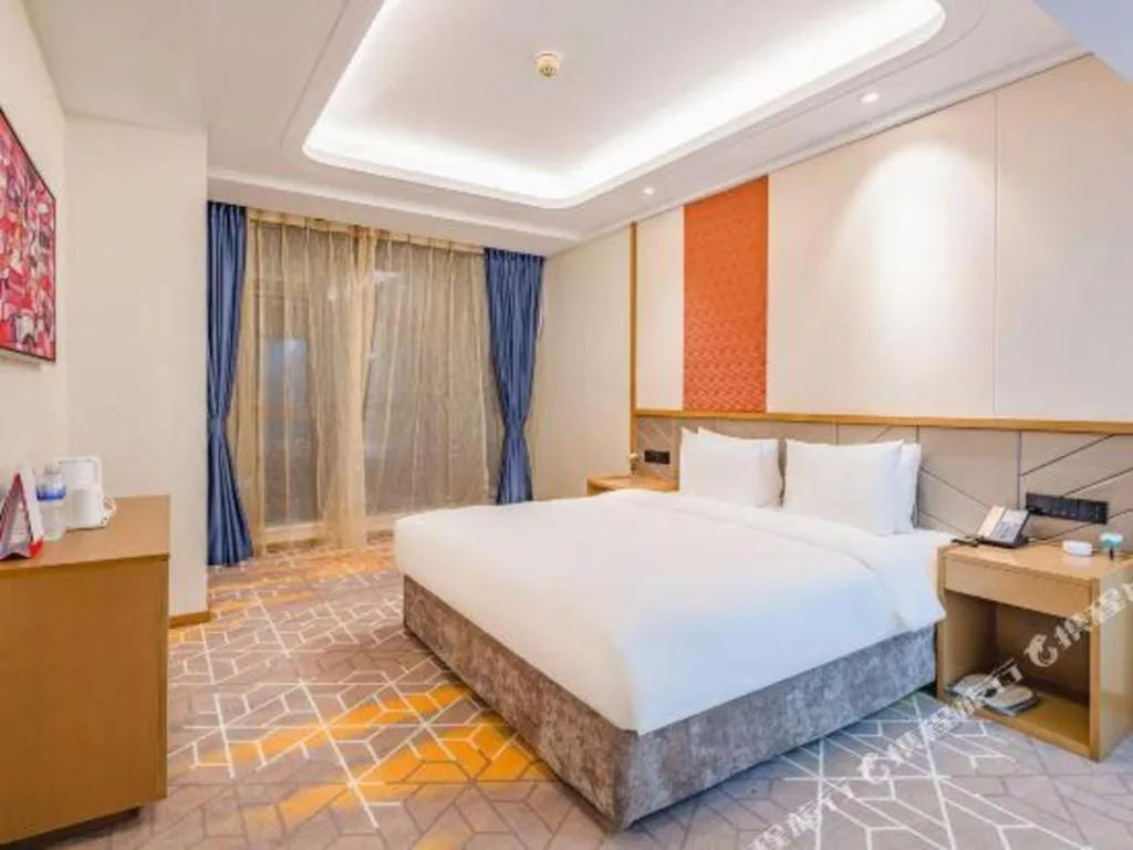 Bed in Gtel Rock City Qingdao Hotel