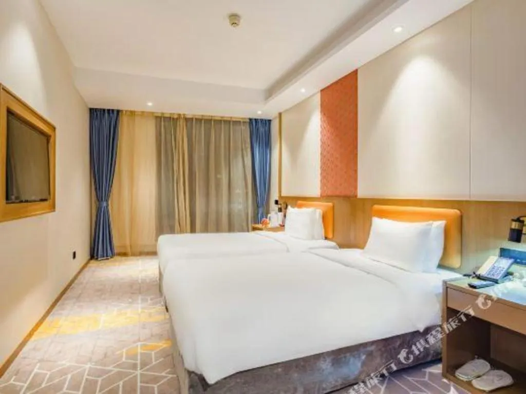 Bed in Gtel Rock City Qingdao Hotel