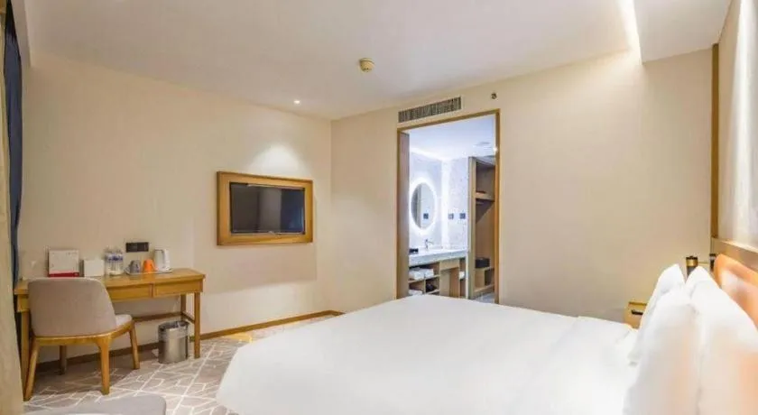 Bed in Gtel Rock City Qingdao Hotel