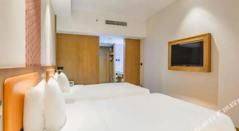 Bed in Gtel Rock City Qingdao Hotel