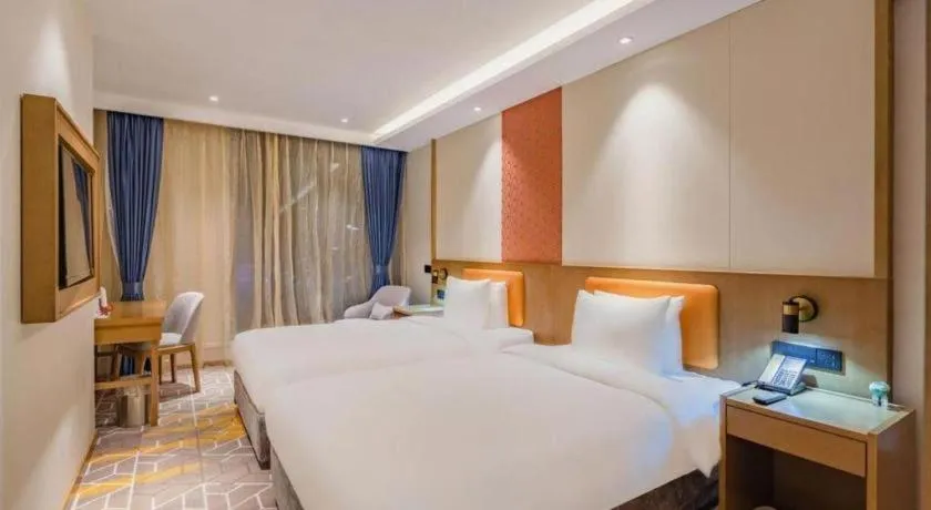 Bed in Gtel Rock City Qingdao Hotel