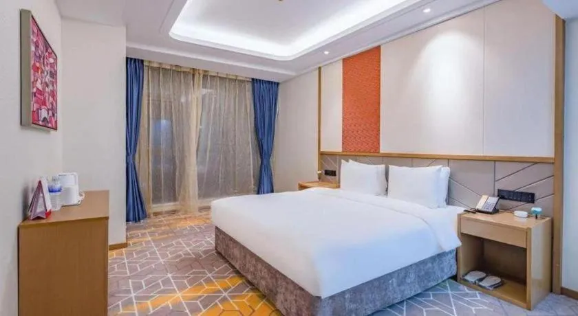 Bed in Gtel Rock City Qingdao Hotel