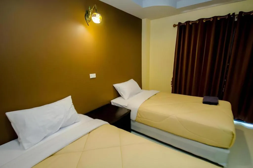 Bed in Maladee Hotel