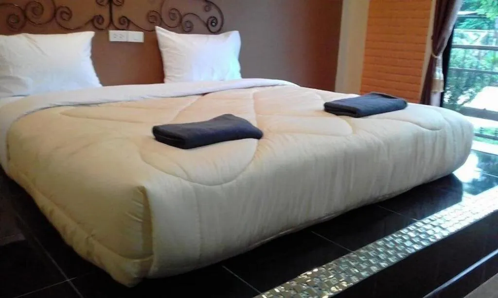 Bed in Maladee Hotel