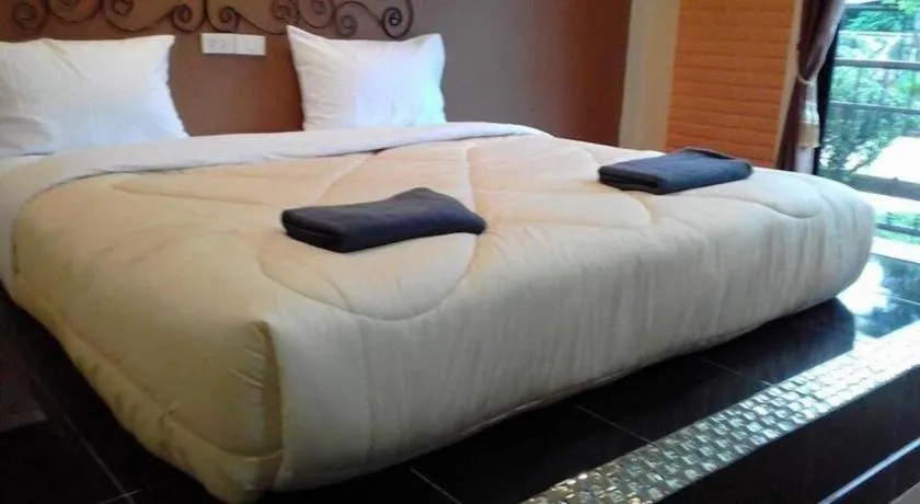 Bed in Maladee Hotel