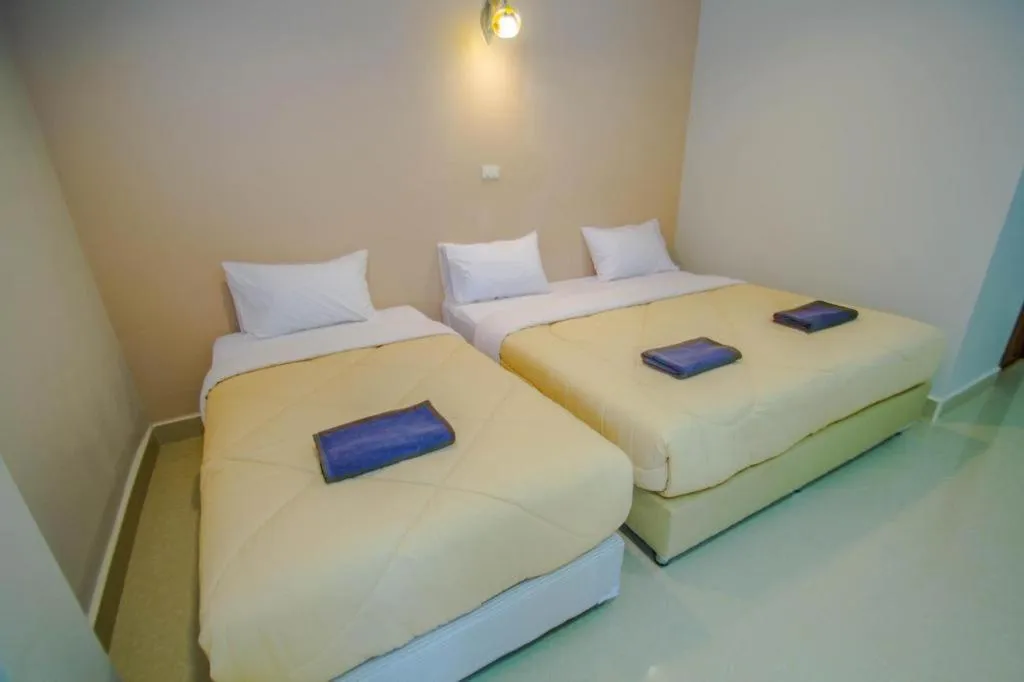 Bed in Maladee Hotel