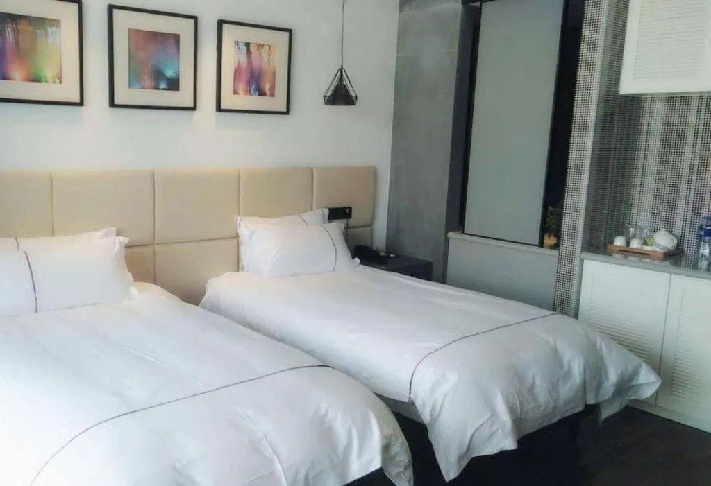 Bed in Muyra Hotel Shanghai