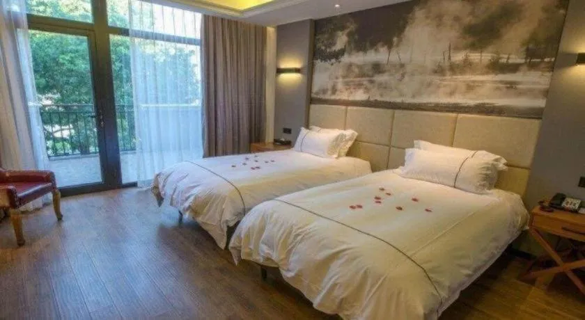 Bed in Muyra Hotel Shanghai