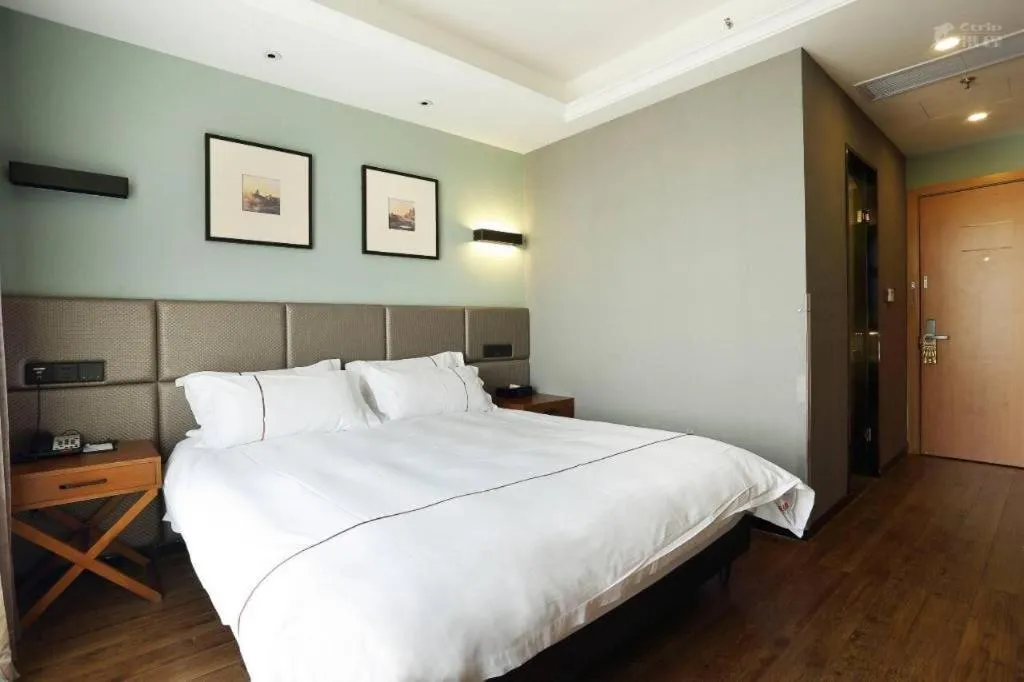 Bed in Muyra Hotel Shanghai