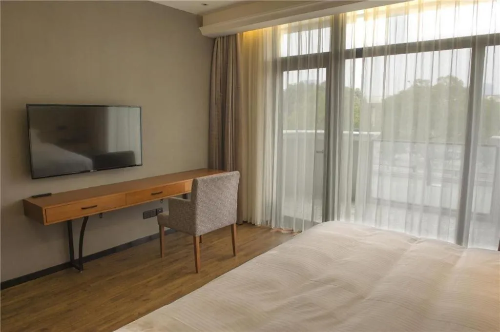 Bed in Muyra Hotel Shanghai