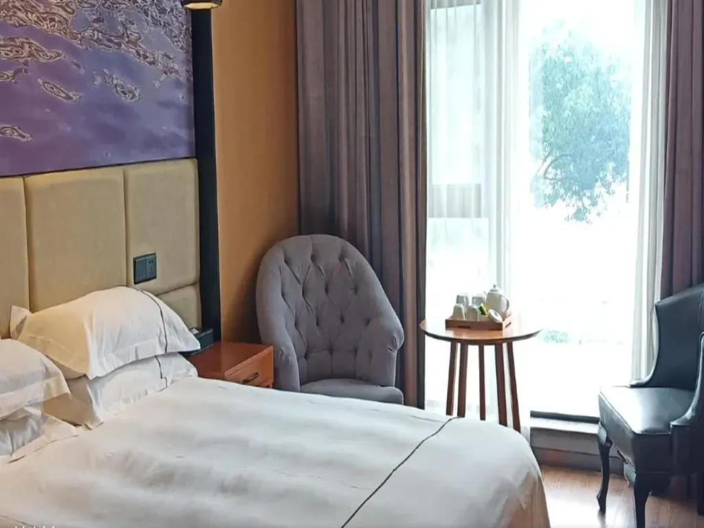 Bed in Muyra Hotel Shanghai