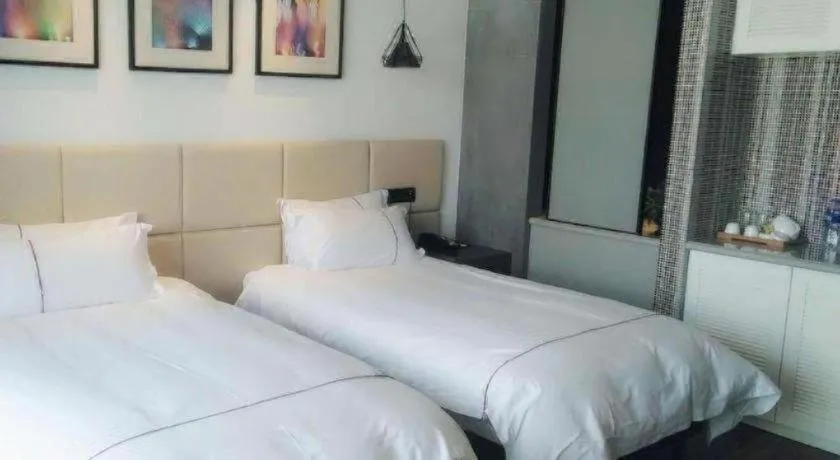 Bed in Muyra Hotel Shanghai