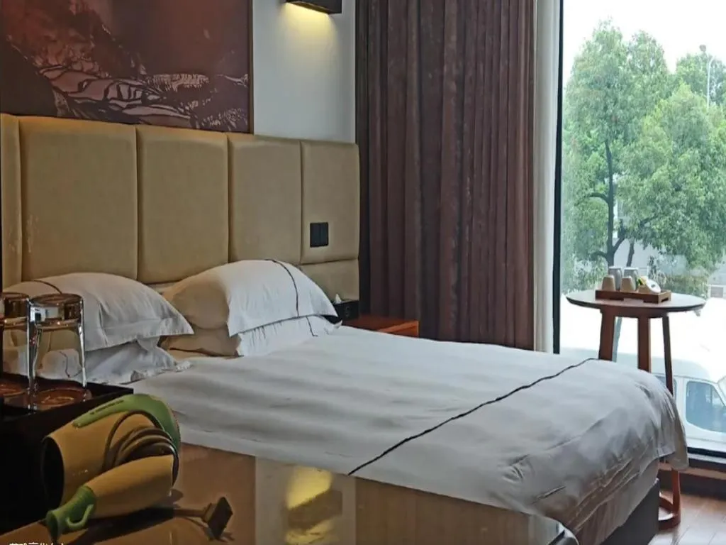 Bed in Muyra Hotel Shanghai