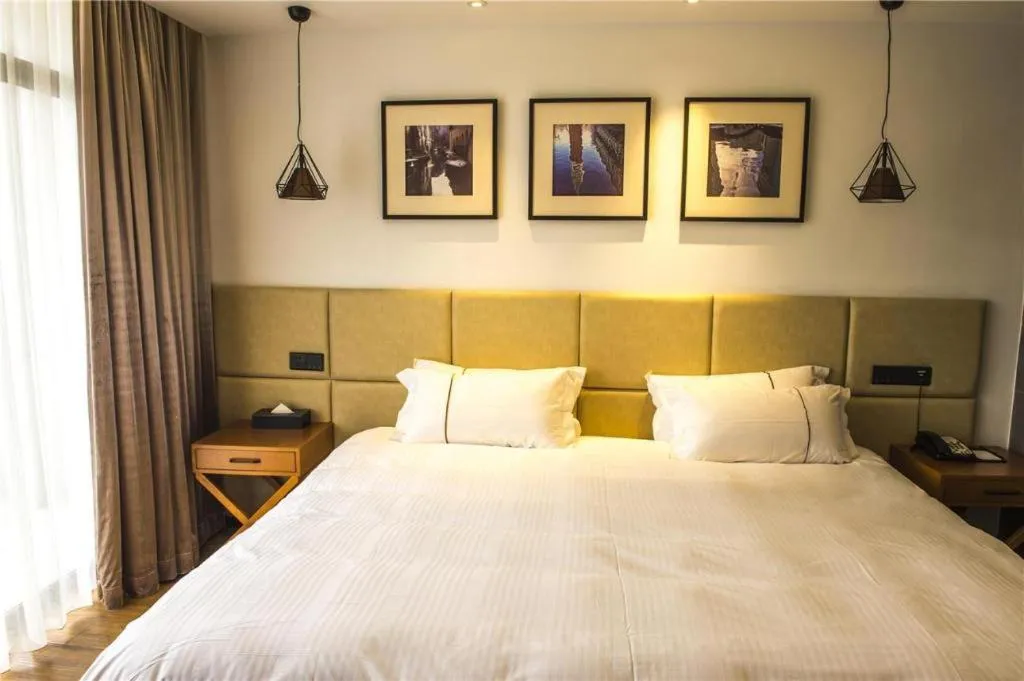 Bed in Muyra Hotel Shanghai