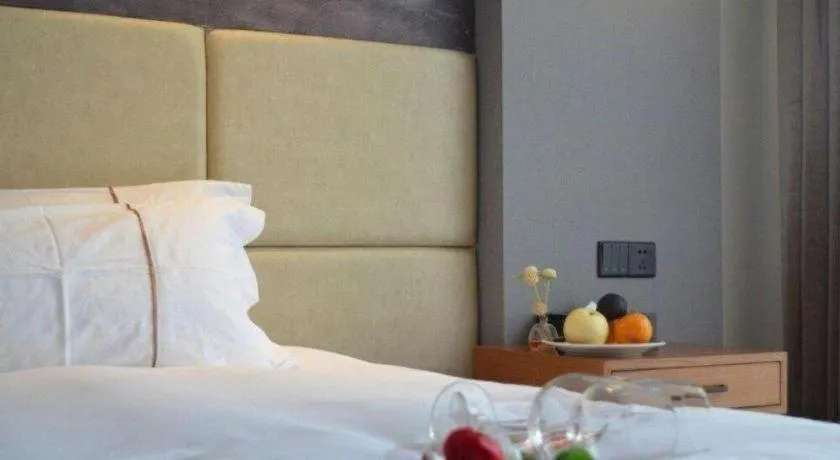 Bed in Muyra Hotel Shanghai