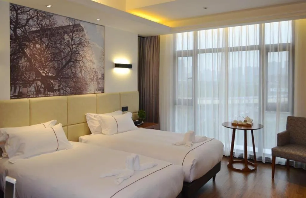 Bed in Muyra Hotel Shanghai