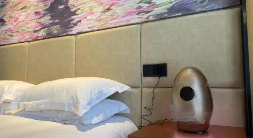 Bed in Muyra Hotel Shanghai