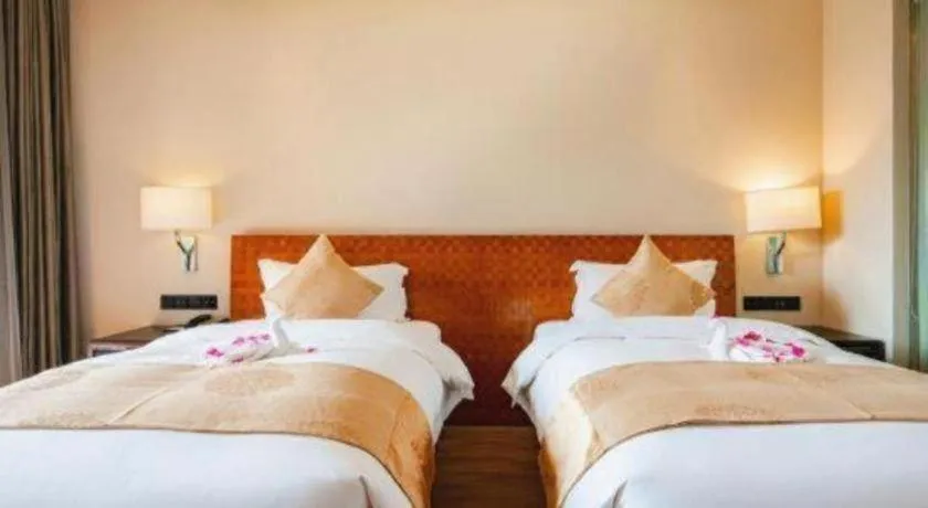 Bed in Hainan Yatai Hot Spring Hotel