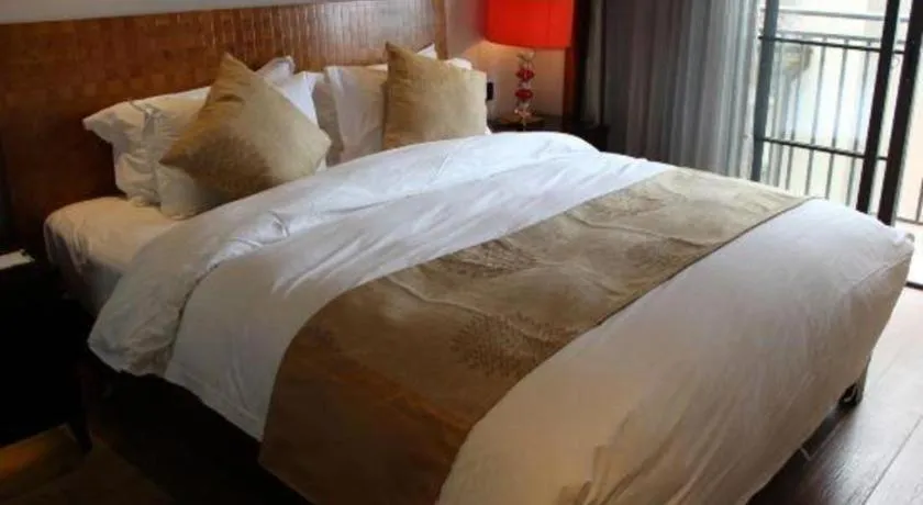 Bed in Hainan Yatai Hot Spring Hotel