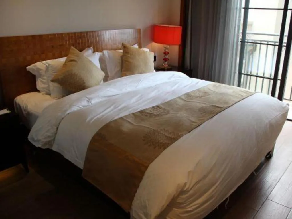 Bed in Hainan Yatai Hot Spring Hotel