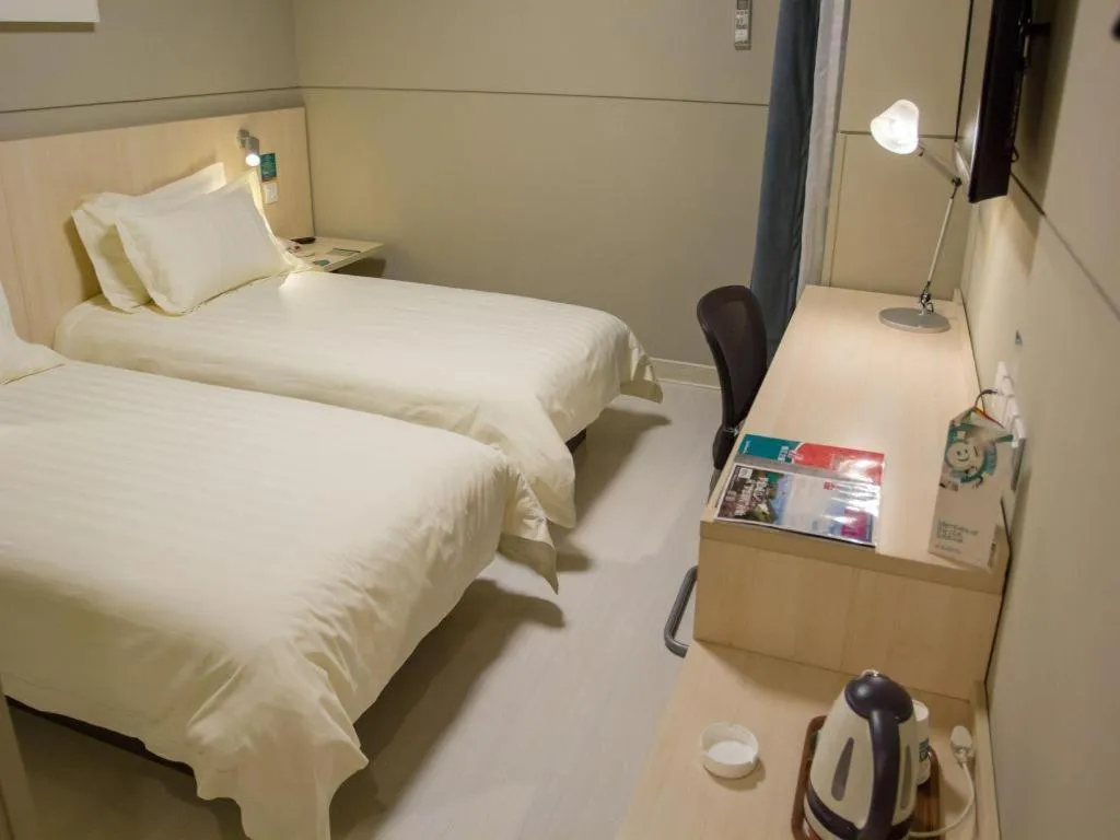 Bed in Jinjiang Inn Shanghai Baoshan Shengqiao