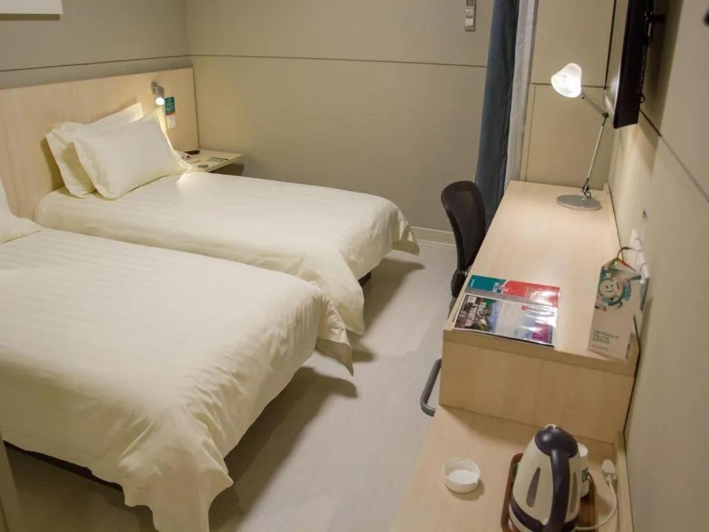 Bed in Jinjiang Inn Shanghai Baoshan Shengqiao