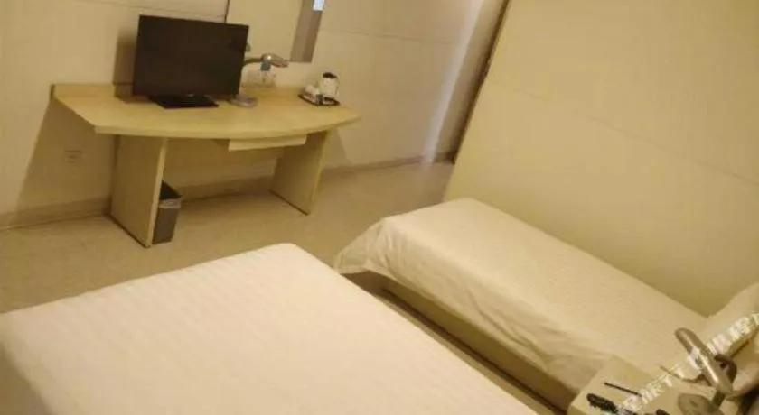 Bed in Jinjiang Inn Shanghai Baoshan Shengqiao