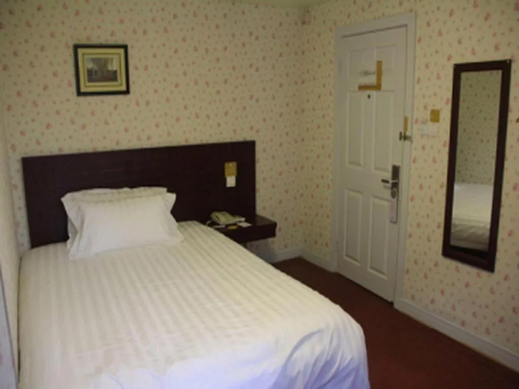 Bed in Jinjiang Inn Shanghai Baoshan Shengqiao