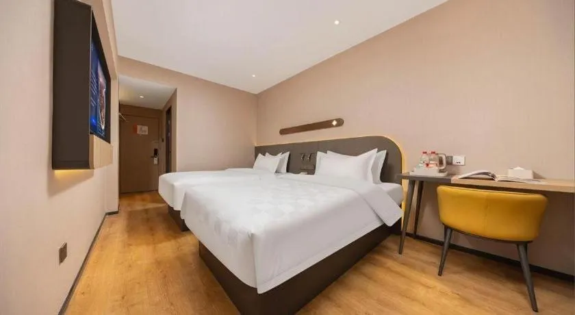 Bed in Jinjiang Inn Henan Museum Hutun Metro Station