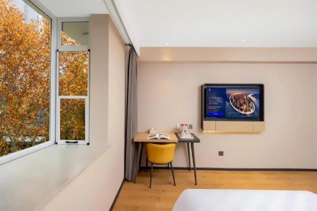 Bed in Jinjiang Inn Henan Museum Hutun Metro Station